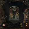 Solar Plexus Chakra Cat T-Shirt featuring a mystical cat with phoenix-like fire, quiet embers flickering behind its ribs, and bone-shaped lanterns symbolizing inner shadows and courage. Gothic, eerie, and whimsical design.